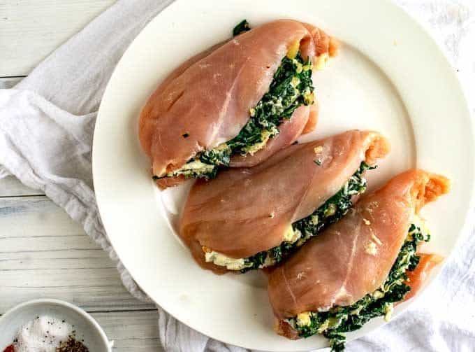 Chicken is stuffed with the spinach and cheese mixture.