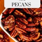 Photo of Keto Pecans in a small white bowl with the text Keto Pecans on a white overlay.