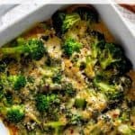 Photo of a Keto Chicken Broccoli Casserole in a white casserole dish.