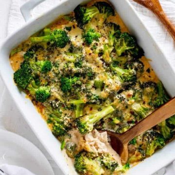 Overhead photo of a keto chicken broccoli casserole with a spoon in it.