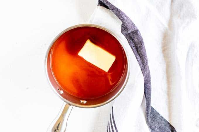 Photo of hot sauce and butter in a small sauce pan.