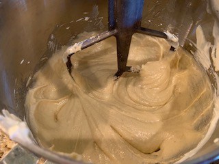  Photo of butter, Swerve, eggs, vanilla extract, almond flour, whey protein powder, psyllium husks, baking powder, salt, and sour cream in a stand mixture.