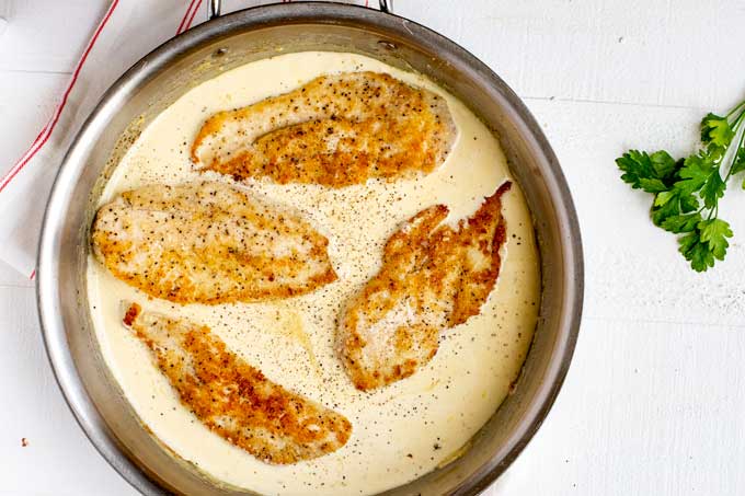 Photo of chicken in a creamy lemon sauce.