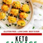 Photo of a plate with three skewers of Keto Cream Cheese Sausage Balls with the recipe title printed beneath it.