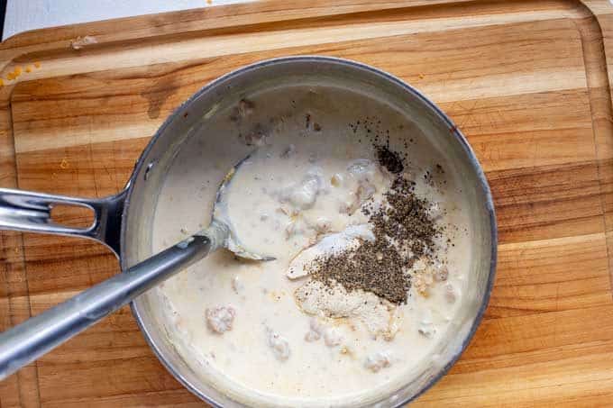 Photo of seasonings that have been added to Keto sausage gravy.
