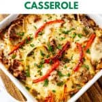 Photo of a cheesy casserole with the text Keto Philly Cheesesteak Casserole above.