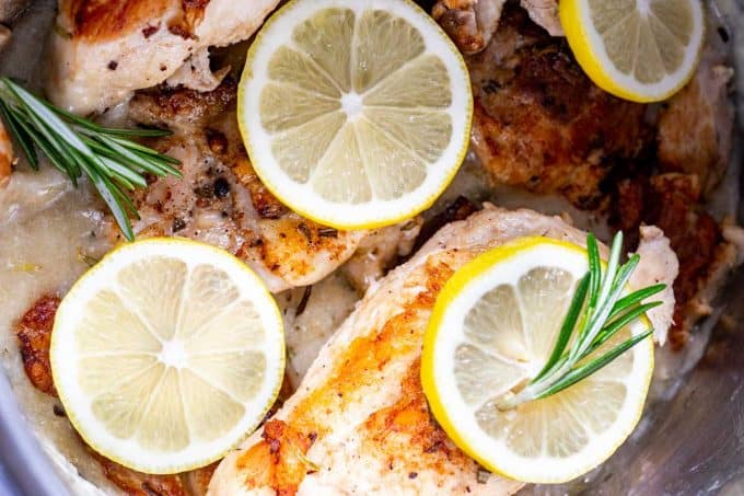 Close up photo of Instant Pot Lemon Rosemary Chicken in the pressure cooker.