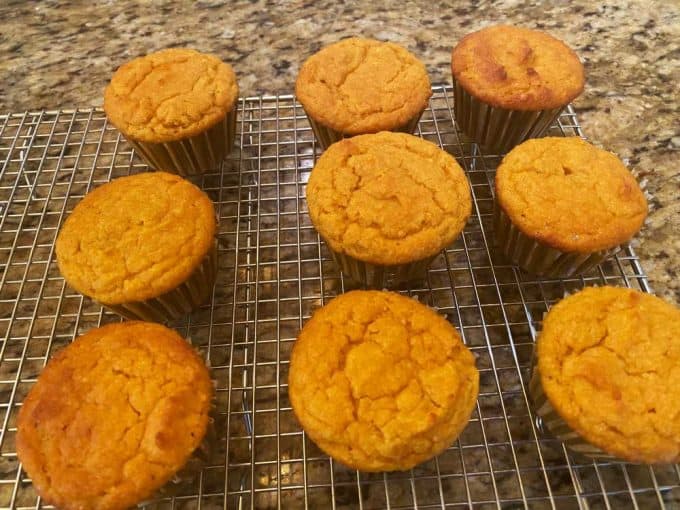 Keto Pumpkin muffins cooling on a wire rack.