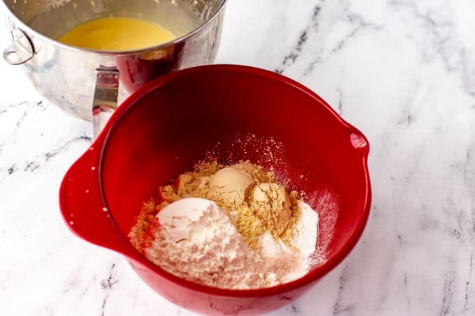 Photo of dry ingredients for Keto Banana Bread in a red bowl.