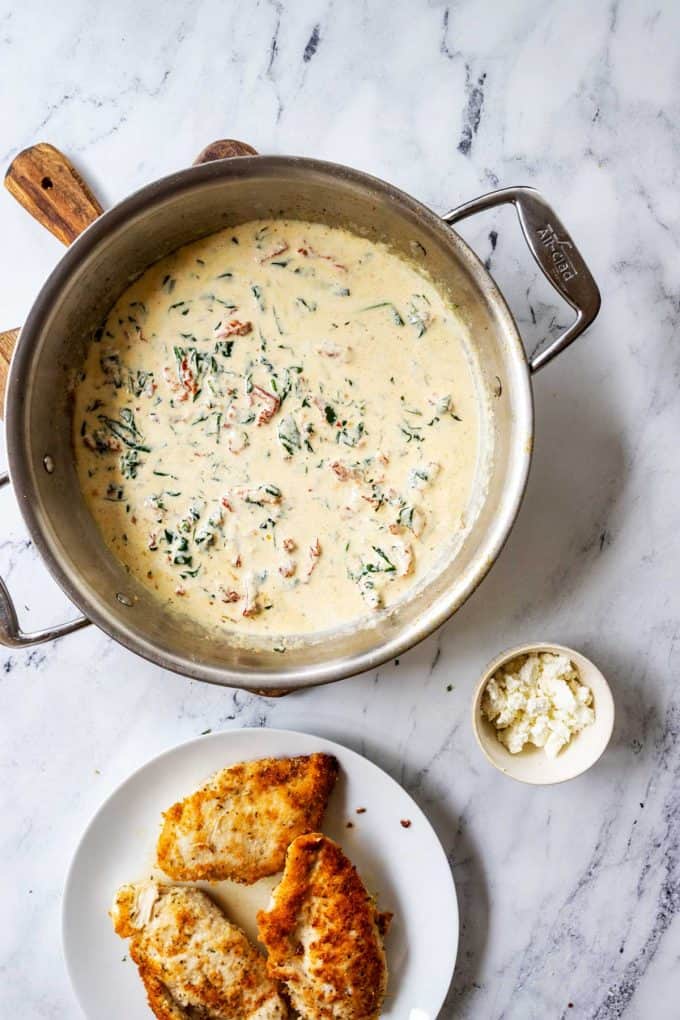 Photo of a skillet of Tuscan cream sauce.