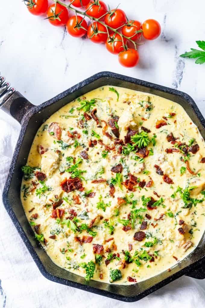 Overhead photo of a cast iron skillet with Easy Keto Chicken Carbonara in it.