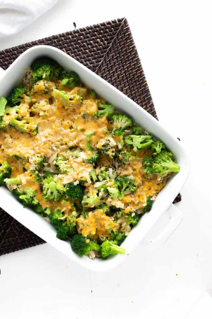 Photo of broccoli and chicken with a cheesy sauce poured over it.