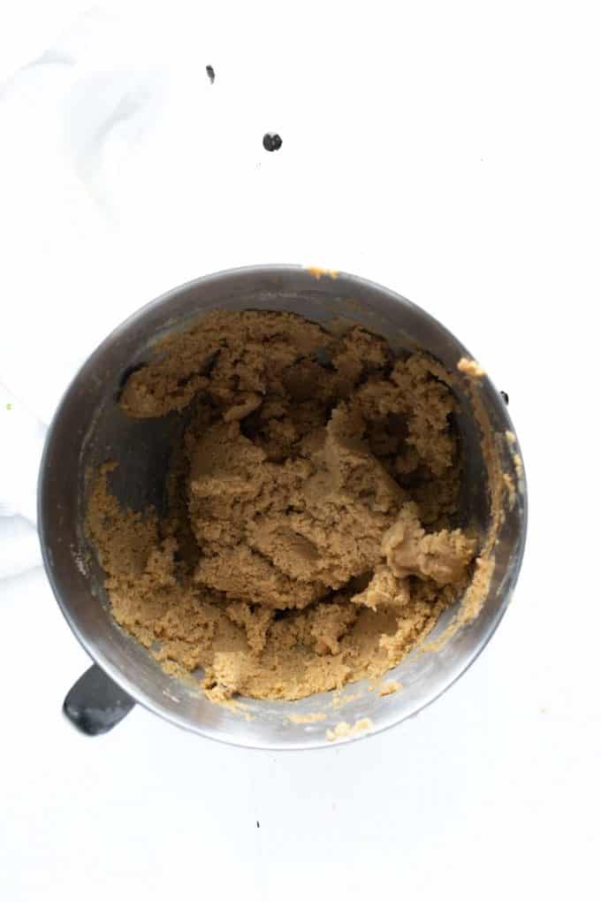 Photo of keto chocolate chip cookie dough that is ready to mix the chocolate chips in.