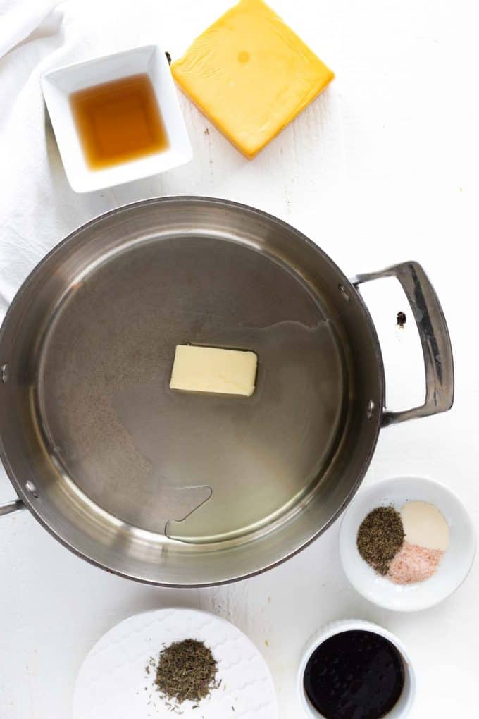 Photo of oil and butter in a skillet.