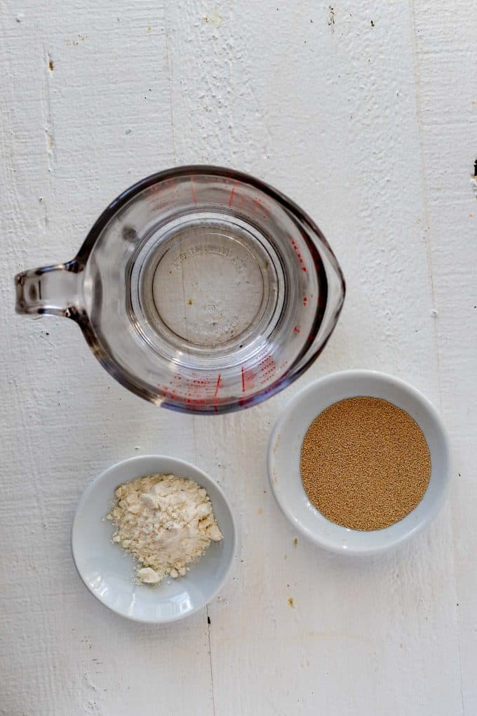 Photo of prep bowls with water, yeast, and inulin powder.