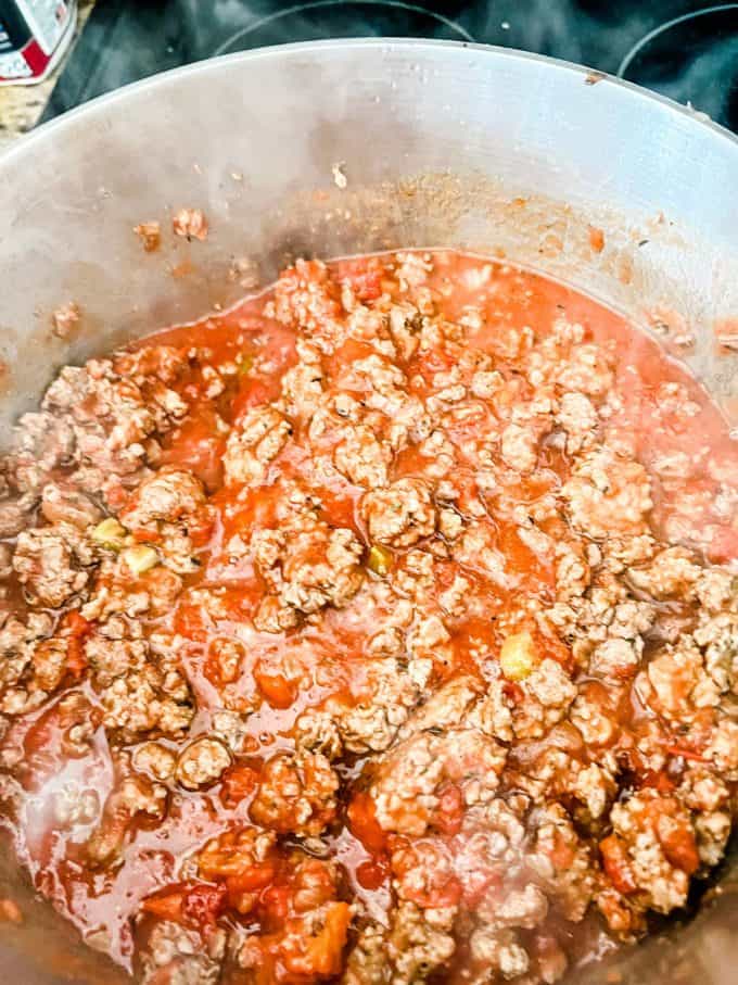 Keto spaghetti sauce cooking in a stockpot.
