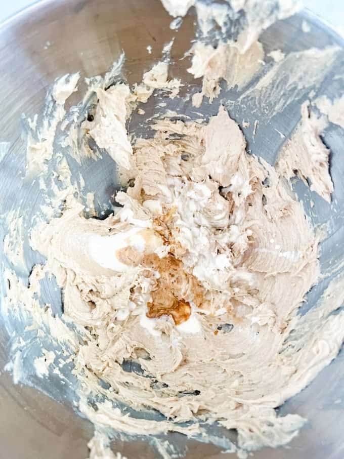 Photo of keto cookie dough in the bowl of a stand mixer.