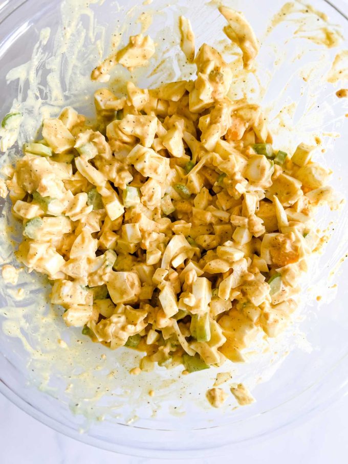Photo of egg salad that has been mixed together.