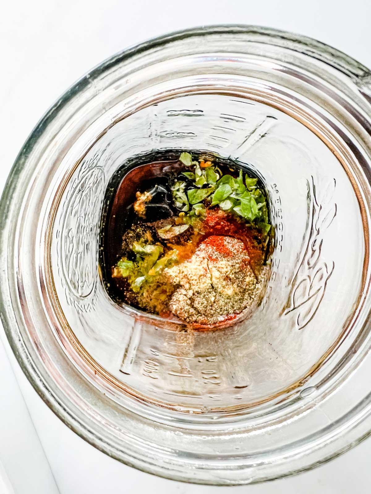 Photo of short rib marinade in a mason jar.