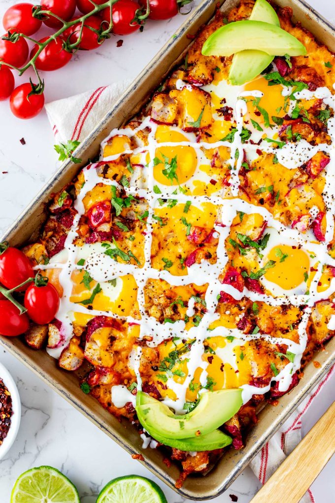 Close up photo of a sheet pan with keto breakfast has in it.