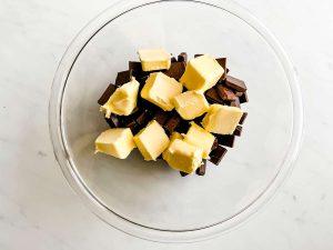 Butter and chocolate in a glass bowl.