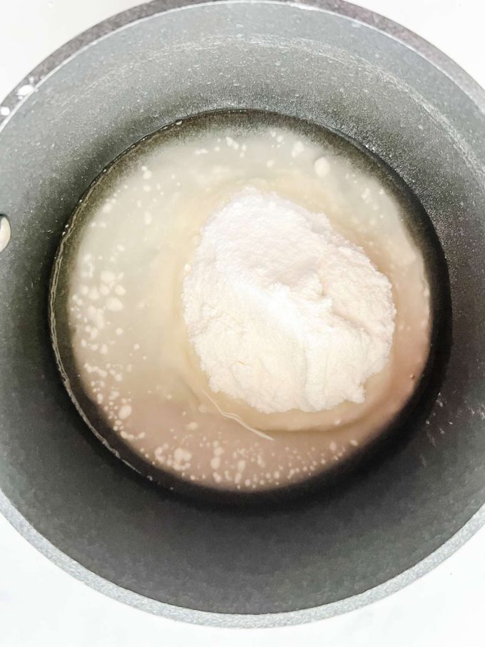 Sweetener and water in a sauce pan.