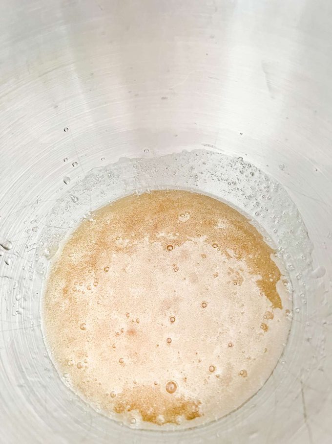 Gelatin, sweetener and water in the bowl of a stand mixer.