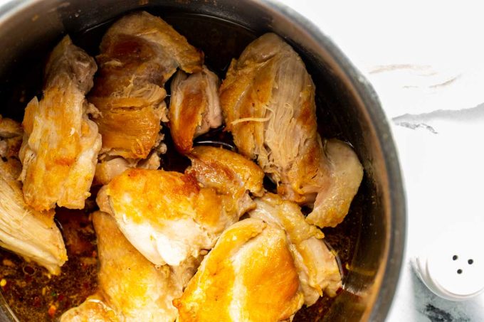 Photo of cooked chicken in an Instant Pot.