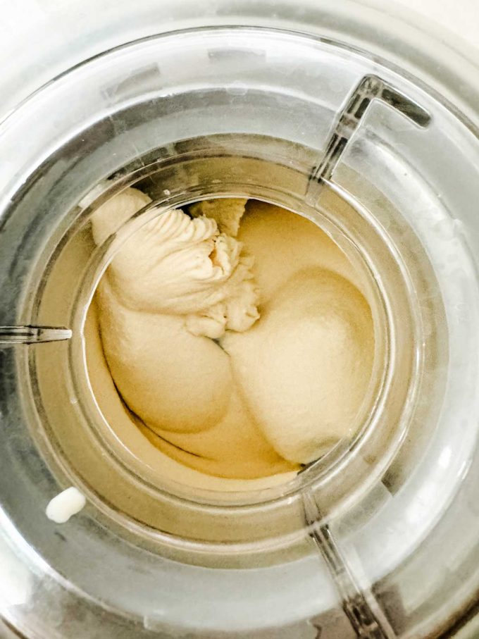 Vanilla ice cream in an ice cream maker.